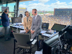 Gus Johnson broadcasting from Michigan Stadium.
